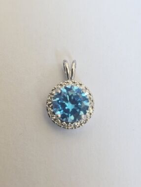 925 Sterling Silver Blue Round Cut Halo CZ December Birthstone Pendant